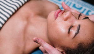 woman's face getting massage